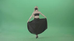 Covid-21 Ballet Girl in mask dancing. Young and tender woman in ballet suit and medical mask solo performing ballet dance in green screen studio.