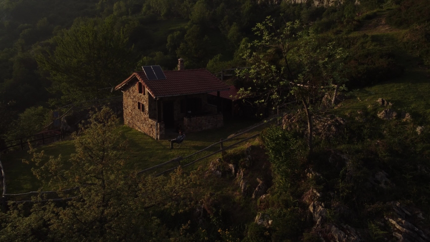 Beautiful mountain hut drone view 
