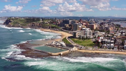 Newcastle city on NSW pacific coast of Australia – aerial flying to CBD as 4k.
