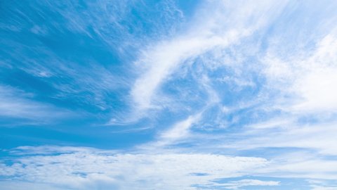 4K. Time-lapse fluffy cloud, moving on blue sky background, 4K. Time-lapse, Beautiful blue sky, with cloudy on a sunny day, Summer cloud video time-lapse, on blue sky background.