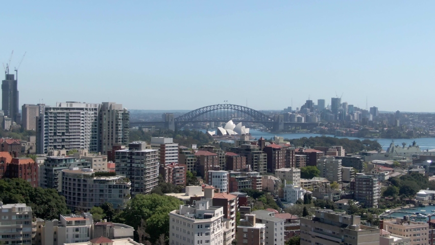 Panorama Of Cityscape With Opera House In Backdrop At Sydney Port In New South Wales, Australia. - Aerial Shot