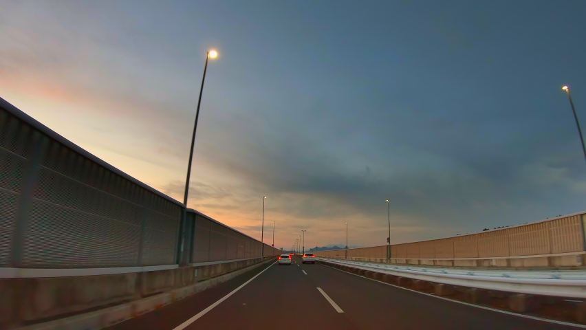 Suburban road with beautiful sunset
