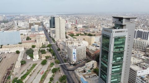 karachi pakistan 2021,  aerial footage of cityscape and landmarks of karachi city, aerial footage of UBL tower at II Chandigarh Road Karachi with train in at station, Business hub of Pakistan