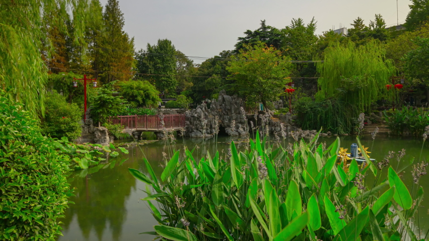 sunny day nanjing city center park pond timelapse panorama 4k china
