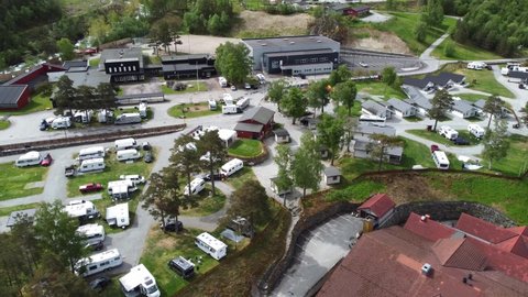 kinsarvik , vestland , Norway - 06 05 2021: Kinsarvik camping - Aerial view of camping spot full of cabins and caravans in summer vacation - Norway