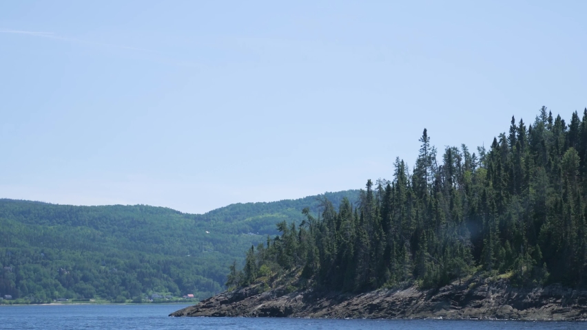 Water lake saguenay fjord coast trees rocks shore landscape water