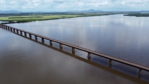 Aerial image with drone of the Rio Branco river and the bridge in the City of Boa Vista, Roraima, Brazil.
