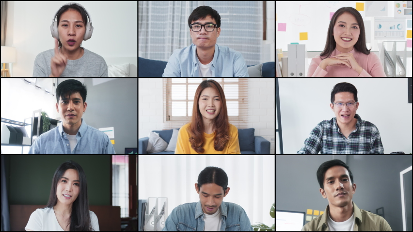 Group of young Asian business people, office coworker on video online conference call, remote team meeting. Work from home, internet communication technology, coronavirus social distancing lifestyle | Shutterstock HD Video #1074931982