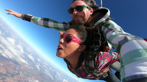 Tandem parachute jump. Selfie video	