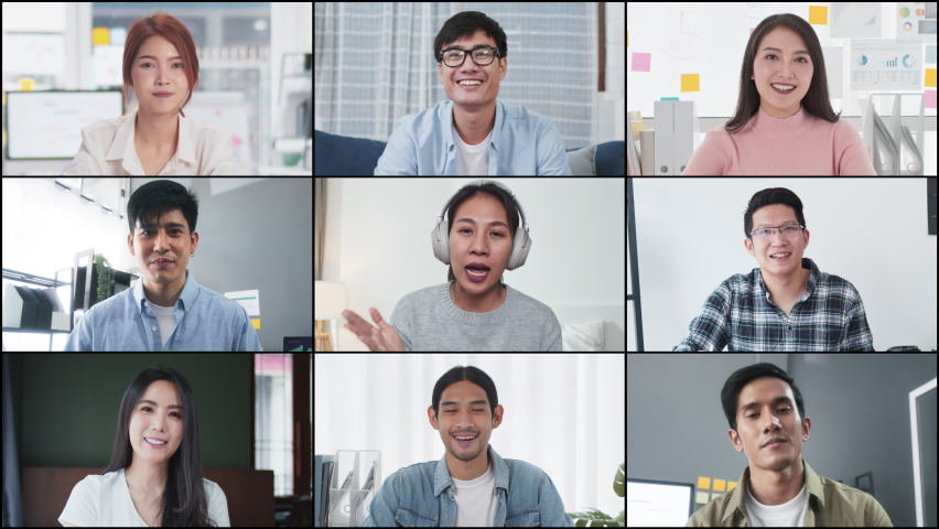 Group of young Asian business people, office coworker on video online conference call, remote team meeting. Work from home, internet communication technology, coronavirus social distancing lifestyle | Shutterstock HD Video #1074980639