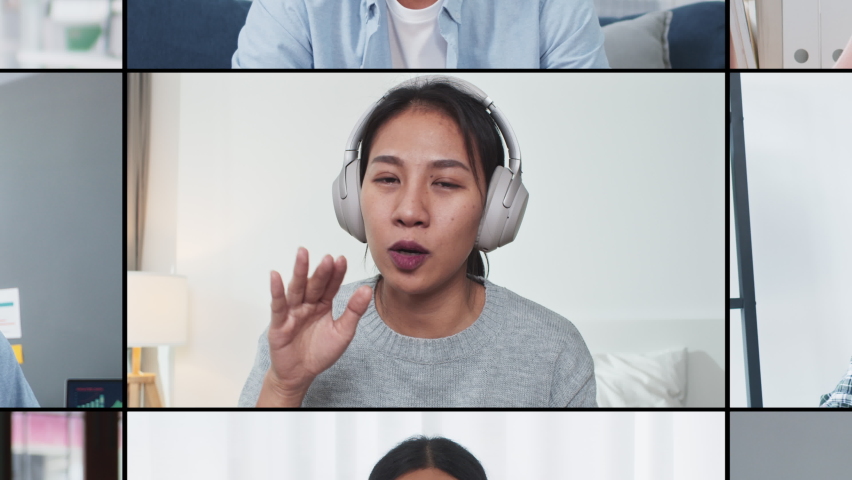Group of young Asian business people, office coworker on video online conference call, remote team meeting. Work from home, internet communication technology, coronavirus social distancing lifestyle | Shutterstock HD Video #1074990125