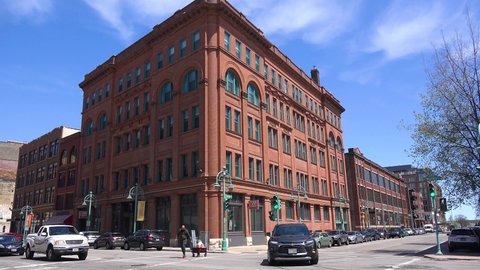 MILWAUKEE, WISCONSIN - CIRCA 2020s - Establishing shot of a brownstone apartment in the Historic Third Ward in downtown Milwaukee, Wisconsin.