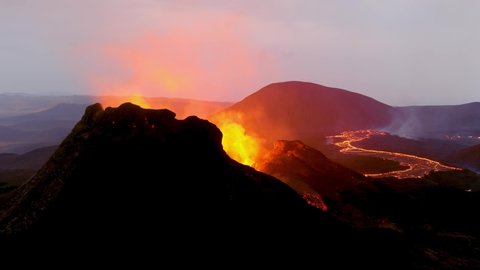 ICELAND - CIRCA 2020s - Incredible night aerial of the dramatic volcanic eruption of the Fagradalsfjall volcano on the Reykjanes Peninsula in Iceland.