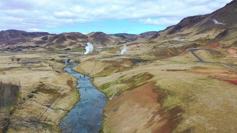 ICELAND - CIRCA 2020s - Beautiful aerial over the Hveragerdi geothermal region along the mid Atlantic ridge in Iceland.