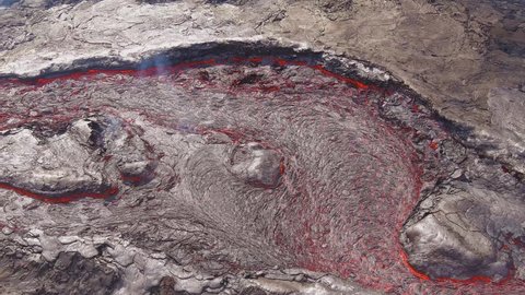 ICELAND - CIRCA 2020s - Beautiful abstract aerial shot of lava rivers flowing near the Fagradalsfjall volcano volcanic explosive eruption in Iceland.