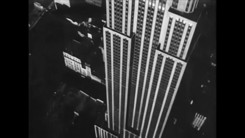 CIRCA 1940 - Excellent aerial footage of New York City skyscrapers, and the Trylon and Perisphere statues at the New York World's Fair.