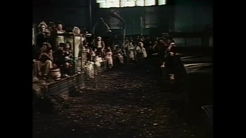 CIRCA 1973 - In this horror film, inmates take over an asylum and imitate chickens while threatening the doctor.