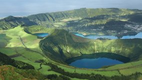 Drone flying over Lagoon of Seven Cities, Sao Miguel island, Azores, Portugal, Europe. Picturesque landscape with lakes in volcanic crater from Miradouro do Cerrado das Freiras viewpoint 4k footage