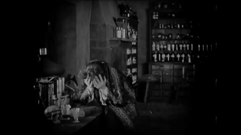 CIRCA 1920 - In this silent horror movie, Dr. Jekyll transforms into Mr. Hyde for the first time.