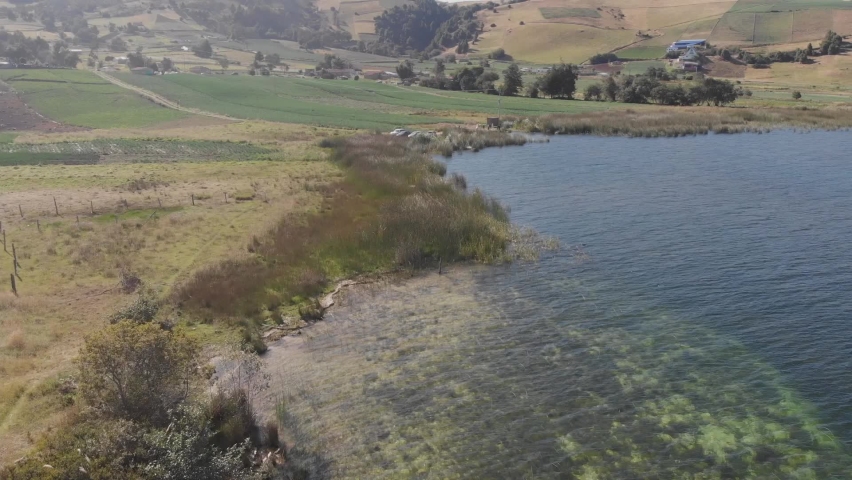 Pull front above Tota lake in a shiny day, in Colombia