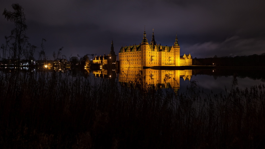 Frederiksborg Castle in Hillerod, Denmark at night seen from the lake