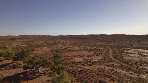 A flyover of a dry billabong in central Australia.