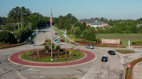 Conway , SC , United States - 06 16 2021: Coastal Carolina University rising aerial establishing shot of South Carolina public college campus and grounds.