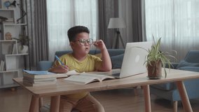Cute Little Boy Having Video Call, Learn Online. Child Use Laptop Computer
