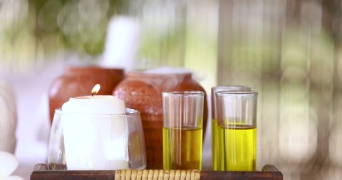  oil and candles with dry ice smoke in spa relax blur bokeh background 4k video 