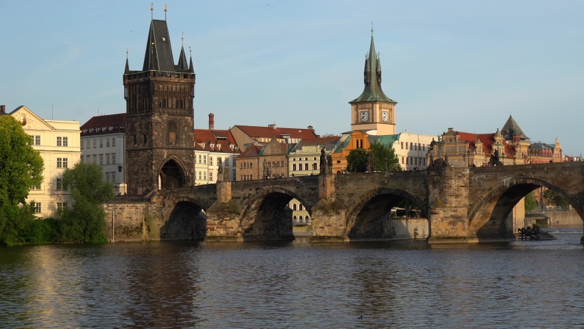 old stones Charles bridge on vltava river in prague city center during summer day Royalty-Free Stock Footage #1075062935