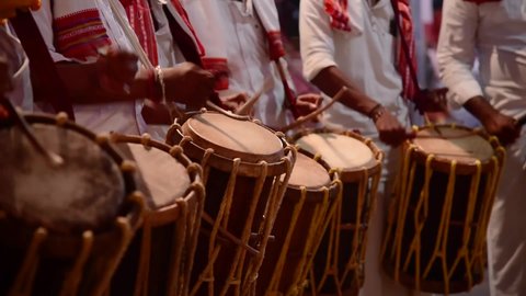 close up of people playing percussion drum in India. Music instrument chende is a percussion instrument used for beats and widely used in Karnataka, Kerala and Tamil Nadu in India.