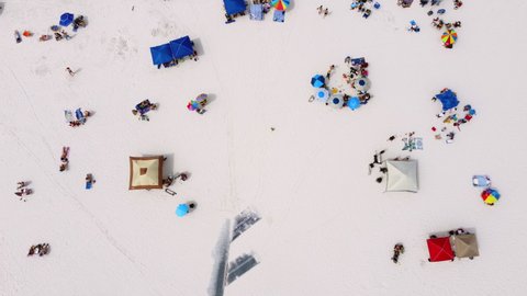 Above Aerial of people enjoying  Siesta Key public beach in Sarasota Florida