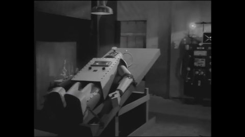 CIRCA 1958 - In this sci-fi film, a mad scientist brings a robot to life in his lab.