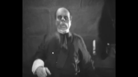 CIRCA 1925 - In this silent adaptation of the Phantom of the Opera, Christine unmasks the Phantom (Lon Chaney) and is horrified by his deformed face.