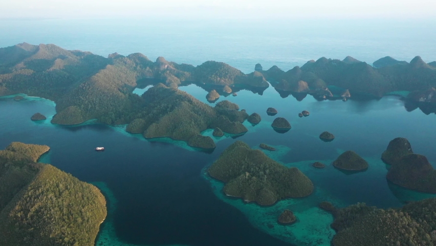 RAJA AMPAT, INDONESIA - CIRCA 2020s - 2020 - Excellent aerial shot of the Wayag Islands, Raja Ampat, Indonesia.