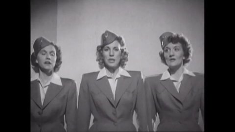 CIRCA 1942 - In this patriotic musical, the Andrews Sisters sing "Johnny Get Your Gun Again" as American soldiers march to boot camp.