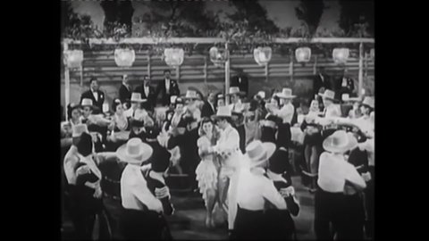 CIRCA 1941 - In this musical, couples dance the rhumba as entertainment at a country club.