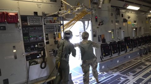 CIRCA 2021 Female soldiers from the 437th and 315th Airlift Wing conduct all women flight and airdrop, Womens History Month.