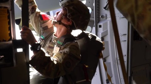 CIRCA 2021 Female soldiers from the 437th and 315th Airlift Wing conduct all women flight and airdrop, Womens History Month.