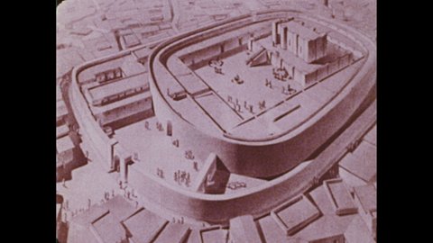 1970s: Illustration of Sumerian temple. Ziggurat temple. Model of ziggurat. Steps up ziggurat. Ruins of ancient city.