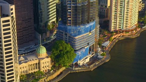 Customs House Restaurant And Under Construction Building Of 443 Queen Street At The Riverbank In Brisbane City, Australia. ascending drone shot
