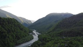 Aerial video from a drone overlooking the Atmospheric mountain landscape in the Kodori Gorge, and the mountain river Kodor, Abkhazia.