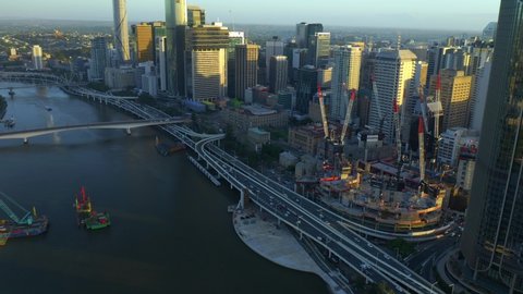 City Landscape Along With 1 William Street Building And Queen's Wharf Brisbane At The Waterfront In Brisbane, Australia. aerial