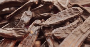 Dried pods, carob. Super food without caffeine and sugar.