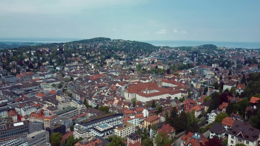 The cathedral of St. Gallen from above. The Stiftsbibliothekin St. Gallen captured with a drone. The city is visible as well.