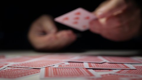 Gambling, Betting, and Winning. Playing a Card Game. One Person Playing Cards and Having Fun. Gamble Competition Gaming Cards.