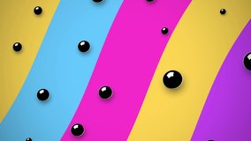 Black spheres on multi colored background in 4k video.
