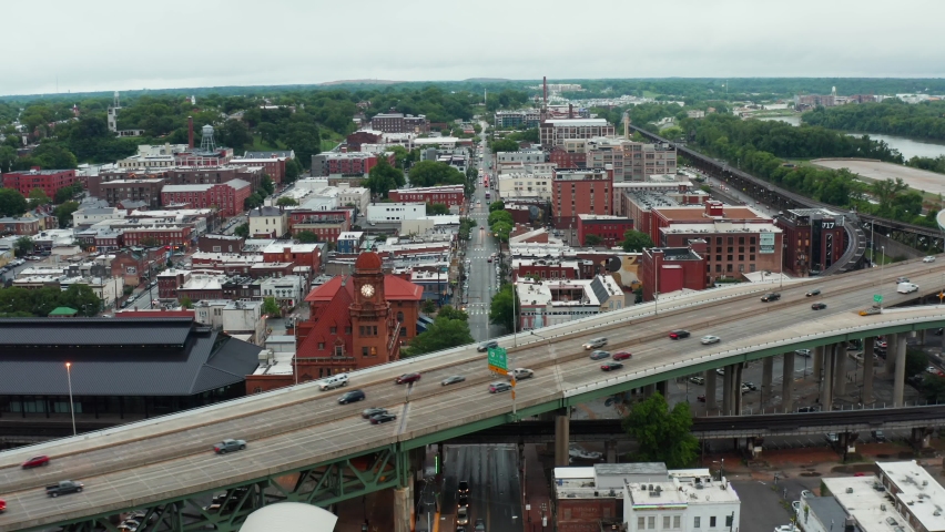 Highway infrastructure in American downtown urban city center in USA. Traffic on interstate freeway.