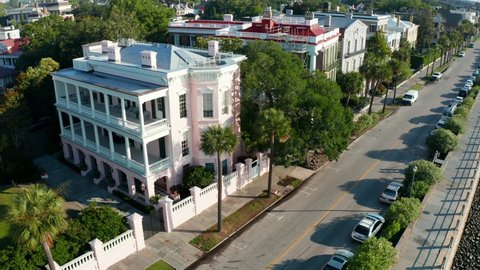 Rainbow Row in Charleston South Carolina. Wealthy antebellum plantation owner planter home estates in American Civil War history. Palmetto State, palm tree symbol for SC, USA.