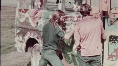 1960s San Francisco, CA. Counterculture Hippie or Hippy paints Psychedelic Colors on Volkswagen Bus or VW Camper Van. Abstract Experimental Animation. 4K Scan of 35mm Film Print
